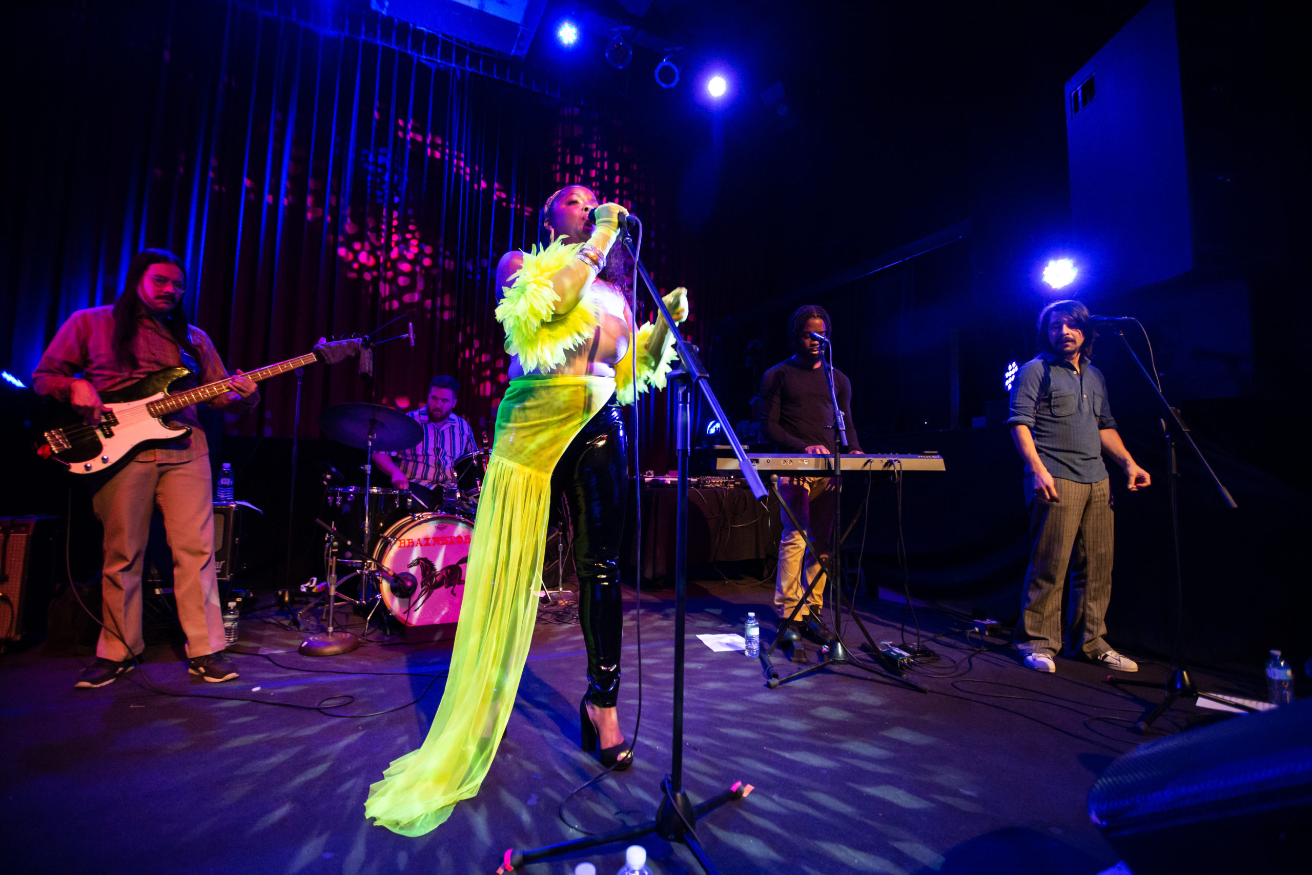 Lady Wray is dressed in neon on the stage of the Fox Cabaret in Vancouver